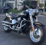 Подержанный мотоцикл Harley-Davidson Fat Boy 103 2017 года, пробег 18500 км, вид сбоку, прозрачный фон
